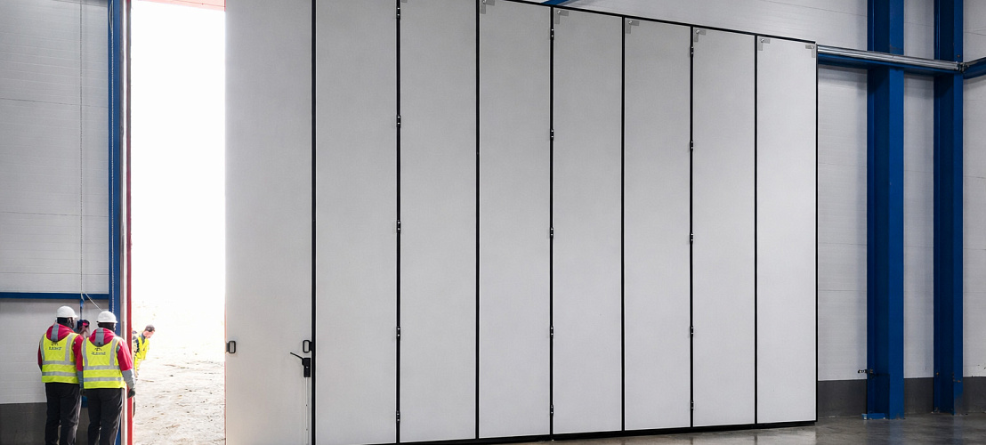 Какие откатные ворота подходят для ангаров: технические и эксплуатационные особенности